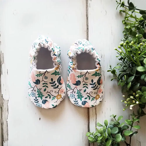 Pair of Valor Plumes Organic Baby Shoes Moccs by Weepereas